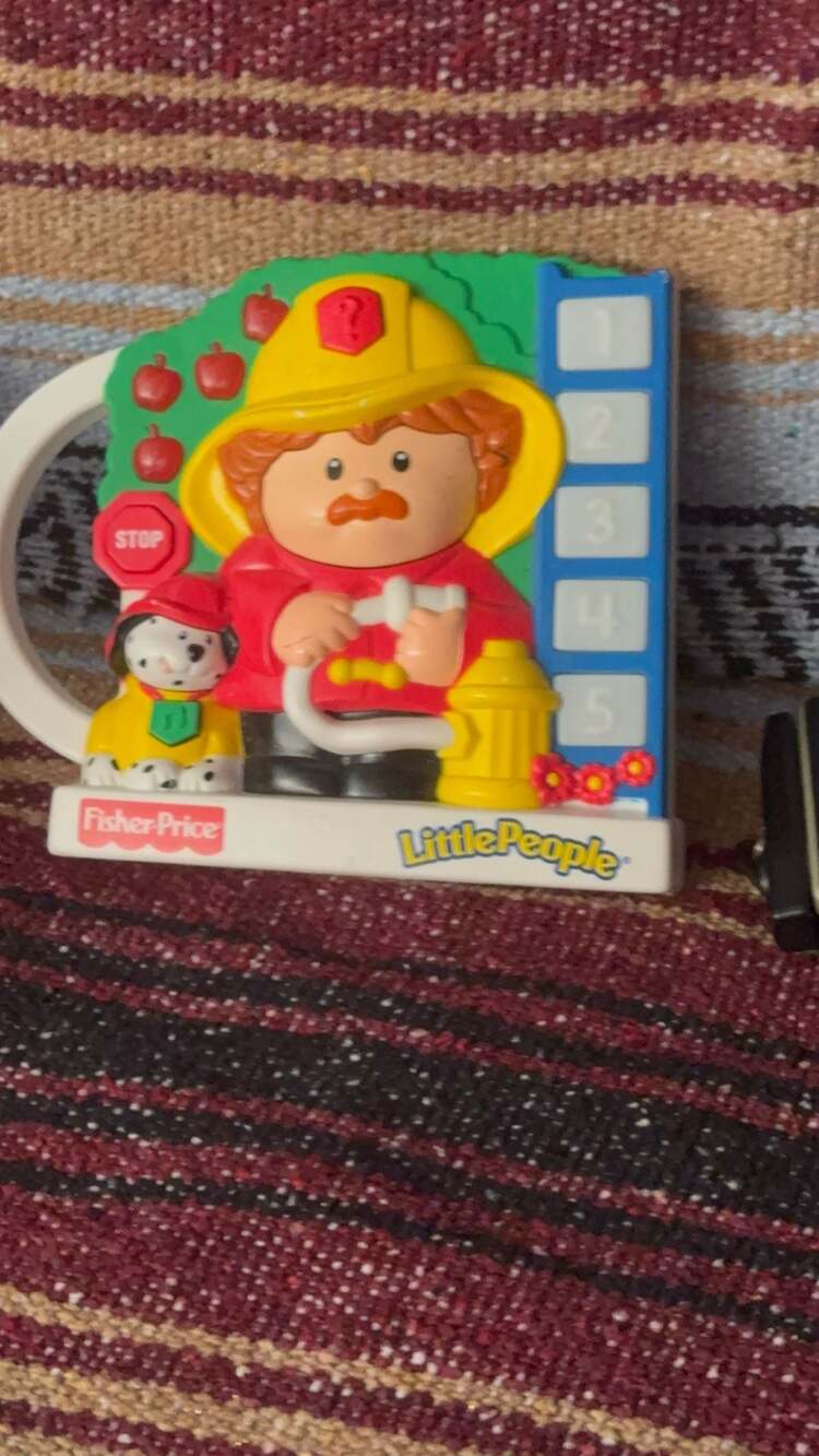 Fisher-Price Little People Growing Smart Firefighter Learning Toy